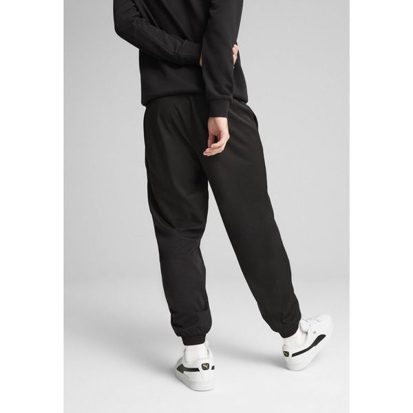 Męskie tkane spodnie Essentials PUMA. Czarne spodnie materiałowe męskie Puma, l, bez wzorów, z poliesteru. Za 256.99 zł.