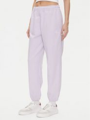 Calvin Klein Jeans Spodnie dresowe Monologo LV047B235G Fioletowy Regular Fit. Fioletowe jeansy damskie Calvin Klein Jeans, xl, bez wzorów, z bawełny. Za 239.99 zł.