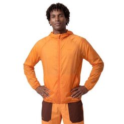 Męska ultralekka wiatroszczelna kurtka trekkingowa Siroko Laugavegur Orange. Brązowe kurtki męskie SIROKO, m, bez wzorów, z materiału, bez kaptura. Za 298.00 zł.