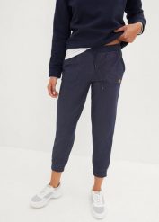 Spodnie dresowe 7/8 o wyglądzie jeansów. Niebieskie spodnie dresowe damskie bonprix, bez wzorów, z bawełny. Za 124.99 zł.