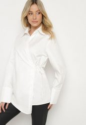 Biała Bawełniana Bluzka Koszulowa Kimono z Asymetrycznym Wiązaniem Delwena. Białe bluzki damskie Born2be, l, bez wzorów, z bawełny, biznesowe, z asymetrycznym kołnierzem, bez ramiączek. Za 139.99 zł.
