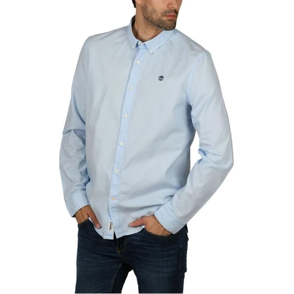 Koszula Męska Timberland LS Ela River Elevated Oxford Solid Slim. Niebieskie koszule męskie Timberland, m, bez wzorów, eleganckie, bez kołnierzyka, bez ramiączek. Za 409.00 zł.