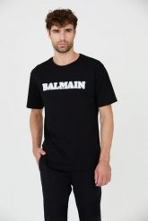 BALMAIN Czarny t-shirt z białym logo Retro Balmain Flock. Czarne t-shirty męskie Balmain, m, bez wzorów, retro, bez kołnierzyka. W wyprzedaży za 1,299.99 zł.