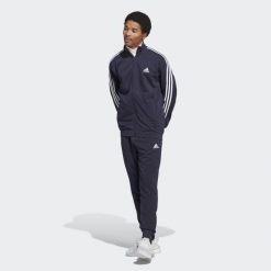 Basic 3-Stripes French Terry Track Suit. Niebieskie spodnie sportowe męskie Adidas, s, bez wzorów, z dresówki, do piłki nożnej. Za 266.99 zł.