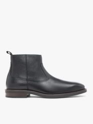 Czarne botki ze skóry licowej. Czarne botki męskie Ryłko, bez wzorów, ze skóry, eleganckie, przed kolano, bez zapięcia. Za 599.99 zł.