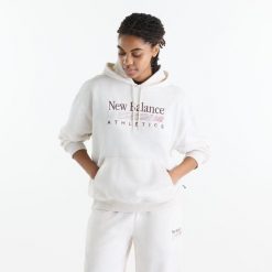 Bluza damska New Balance WT6288NOLIT - biała. Białe bluzy damskie New Balance, m, bez wzorów, z bawełny, bez kaptura. Za 299.99 zł.