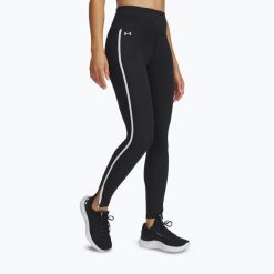 Legginsy Under Armour Motion Piped. Czarne obuwie sportowe damskie Under Armour, bez wzorów, na fitness i siłownię. Za 159.99 zł.