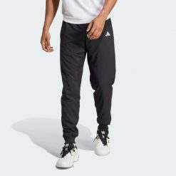 Spodnie tenisowe Walk-On. Czarne koszulki sportowe męskie Adidas, bez wzorów, tenisowe. Za 329.00 zł.