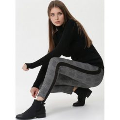 Czarne Spodnie Geraldine. Czarne spodnie dresowe damskie Born2be, l, bez wzorów, z dresówki. Za 49.99 zł.