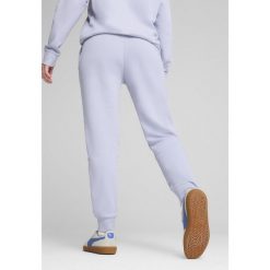 Damskie spodnie dresowe z małym logo No.1 ESS PUMA Cool Weather Blue. Niebieskie spodnie dresowe damskie Puma, m, bez wzorów, z dresówki, do biegania. W wyprzedaży za 114.00 zł.