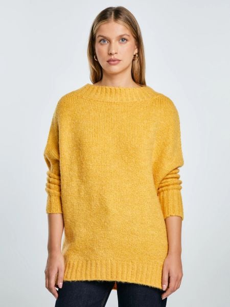 Sweter damski oversize z dodatkiem wełny żółty Mayamiko 201. Żółte swetry damskie Big Star, bez wzorów, z dzianiny, eleganckie, bez kołnierzyka, bez ramiączek, bez kaptura. Za 249.99 zł.