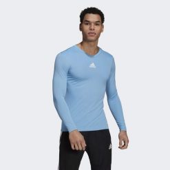 Koszulka piłkarska męska adidas Team Base Tee. Niebieskie koszulki sportowe męskie Adidas, m, bez wzorów, bez kołnierzyka, bez ramiączek, do piłki nożnej. Za 69.90 zł.