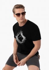 T-shirt z nadrukiem T-NEX. Czarne t-shirty męskie Volcano, l, bez wzorów, z bawełny, klasyczne, bez kołnierzyka. Za 69.99 zł.