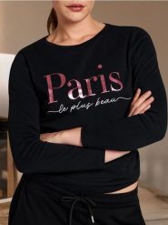 Koszulka z długimi rękawami - czarny. Czarne t-shirty damskie Sinsay, l, bez wzorów, bez kołnierzyka. W wyprzedaży za 11.99 zł.