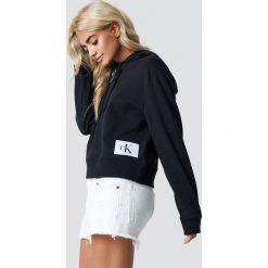 Calvin Klein Bluza z kapturem Harrisom True Icon - Black. Czarne bluzy damskie Calvin Klein, z aplikacjami, z dzianiny. Za 404.95 zł.