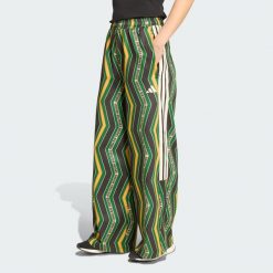Spodnie dresowe adidas x FARM Tiro. Czarne obuwie sportowe damskie Adidas, l, bez wzorów, z dresówki, na fitness i siłownię. Za 279.00 zł.