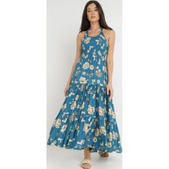 Niebieska Sukienka z Wiskozy Damaleia. Niebieskie sukienki damskie Born2be, m, z aplikacjami, z tkaniny, bez kołnierzyka, bez ramiączek, maxi, dopasowane. Za 29.99 zł.