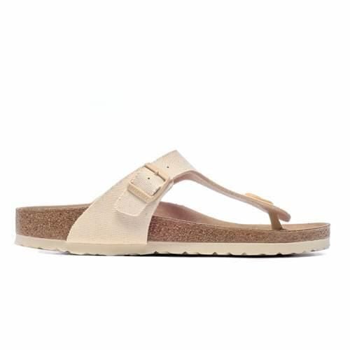 Klapki damskie Birkenstock Gizeh Tex Canvas Eggshell Veg. Żółte skarpety damskie Birkenstock, bez wzorów, z materiału. W wyprzedaży za 389.40 zł.