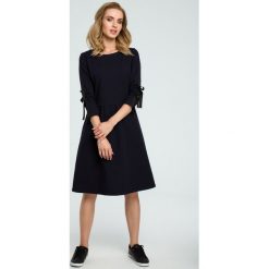 Sukienka z wiązanymi lampasami moe388. Niebieskie sukienki dla dziewczynek MOE, eleganckie. Za 139.00 zł.