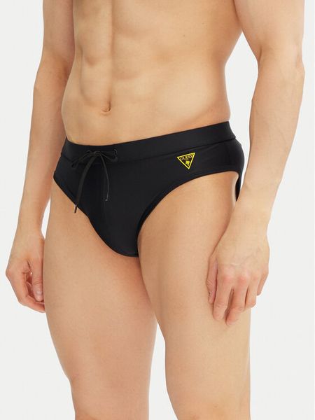 Guess Kąpielówki F5GT25 LY00K Czarny. Czarne kąpielówki męskie Guess, l, z aplikacjami, z syntetyku. Za 119.99 zł.