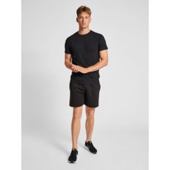Hummel Koszulka sportowa męska Treningowa Hummel Red Heavy T-Shirt. Czarne koszulki sportowe męskie Hummel, m, bez wzorów, z bawełny, klasyczne, bez kołnierzyka. Za 56.99 zł.