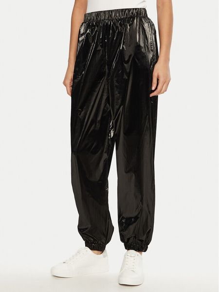 Guess Spodnie dresowe V5RB09 WGUJ0 Czarny Regular Fit. Czarne spodnie dresowe damskie Guess, xxs, z aplikacjami, z dresówki. Za 269.99 zł.