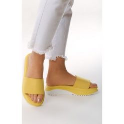 Żółte Klapki Redress. Żółte klapki damskie Born2be, bez wzorów, sportowe, bez obcasa, na platformie. Za 34.99 zł.