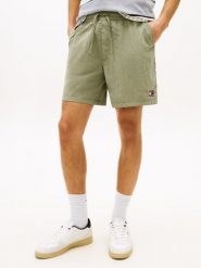 Tommy Jeans spodenki kąpielowe Mężczyźni Sztuczne włókno zielony, L. Zielone kąpielówki męskie Tommy Jeans, l, bez wzorów, z jeansu. Za 229.95 zł.