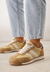 Żółte Sneakersy z Dwoma Paskami Evilirea. Żółte obuwie sportowe damskie Born2be, bez wzorów, z dresówki. Za 109.99 zł.