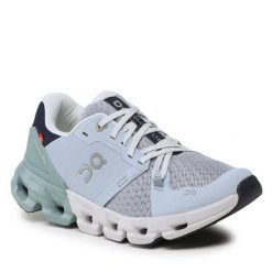 Buty do biegania On. Niebieskie obuwie sportowe damskie On, bez wzorów, do biegania. Za 469.99 zł.