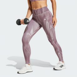 Legginsy Optime Full-Length Print. Czarne bielizna termoaktywna damska Adidas, m, bez wzorów, z materiału, bez ramiączek. W wyprzedaży za 250.45 zł.