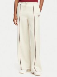 Reebok Spodnie dresowe Oliwia RK25683CCW Beżowy Regular Fit. Brązowe spodnie dresowe damskie Reebok, m, bez wzorów, z bawełny. Za 199.99 zł.