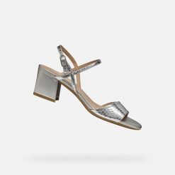 Sandały GEOX D NEW ERAKLIA 50 Srebrny. Szare sandały damskie Geox, bez wzorów, ze skóry, bez obcasa, bez zapięcia. Za 432.99 zł.