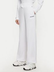 Tommy Hilfiger Spodnie dresowe UW0UW05577 Biały Relaxed Fit. Białe spodnie dresowe damskie Tommy Hilfiger, m, bez wzorów, z bawełny. Za 159.99 zł.