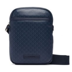 Saszetka Calvin Klein. Niebieskie saszetki męskie Calvin Klein, młodzieżowe, małe. Za 369.99 zł.