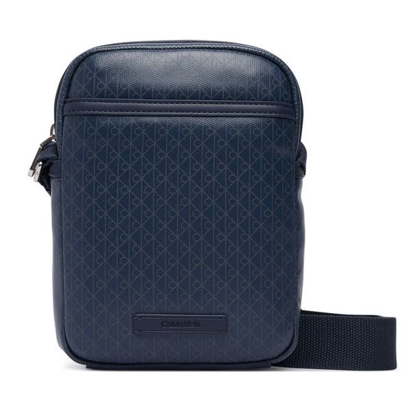 Saszetka Calvin Klein. Niebieskie saszetki męskie Calvin Klein, młodzieżowe, małe. Za 369.99 zł.