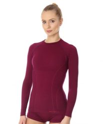 Koszulka wełniana z długim rękawem damska Brubeck ACTIVE WOOL. Fioletowe koszulki sportowe damskie Brubeck, s, bez wzorów, z materiału, bez kołnierzyka, bez ramiączek, trekkingowe. Za 243.99 zł.