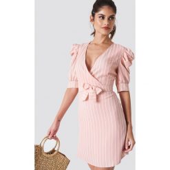 Trendyol Sukienka midi z bufiastym rękawem - Pink. Sukienki damskie marki Trendyol. Za 141.95 zł.