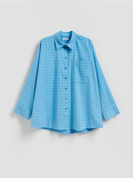 Koszula oversize - jasnoniebieski. Niebieskie koszule damskie Reserved, l, bez wzorów, z tkaniny, bez kołnierzyka, bez ramiączek. W wyprzedaży za 109.99 zł.