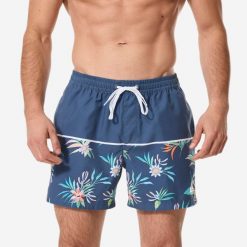 Spodenki surfingowe męskie Quiksilver Trop krótkie 15". Niebieskie kąpielówki męskie Quiksilver, l, bez wzorów, z materiału, krótkie. Za 199.99 zł.