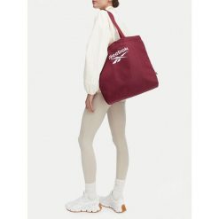Torebka Reebok. Czerwone torebki do ręki damskie Reebok, bez wzorów, bez dodatków. Za 69.99 zł.