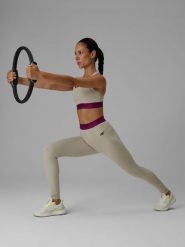 4F Legginsy treningowe szybkoschnące damskie - beżowe M. Brązowe legginsy sportowe damskie 4f, m, bez wzorów, z podwyższonym stanem, długie, na fitness i siłownię. Za 169.99 zł.