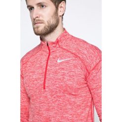 Nike - Longsleeve. Różowe bluzki z długim rękawem męskie Nike, z dzianiny, polo. W wyprzedaży za 129.90 zł.