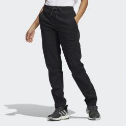 Provisional Pants. Czarne obuwie sportowe damskie Adidas, bez wzorów, z materiału, na golfa. W wyprzedaży za 319.15 zł.