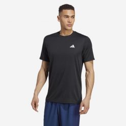 Koszulka fitness męska ADIDAS krótki rękaw. Czarne koszulki sportowe męskie Adidas, m, bez wzorów, z materiału, bez kołnierzyka, bez ramiączek, na fitness i siłownię. Za 79.99 zł.