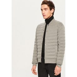Pikowana bluza - Szary. Bluzy męskie marki KALENJI. W wyprzedaży za 79.99 zł.