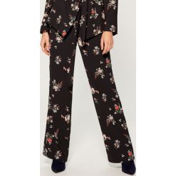 Spodnie palazzo Gold Label - Wielobarwn. Spodnie materiałowe damskie marki Mohito. W wyprzedaży za 29.99 zł.
