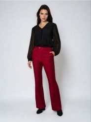 Spodnie flare - koralowy. Pomarańczowe spodnie materiałowe damskie Sinsay, l, bez wzorów. Za 49.99 zł.