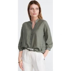 Bawełniana koszula oversize - Khaki. Koszule damskie marki Reserved. Za 99.99 zł.
