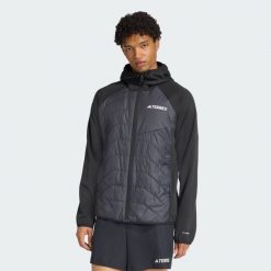 Ocieplana hybrydowa kurtka z kapturem Terrex Multi CLIMAWARM. Czarne kurtki sportowe męskie Adidas, m, bez wzorów, trekkingowe, climawarm (adidas). Za 529.00 zł.